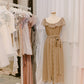 Abito chiffon con bottoni